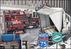  A crash late Friday morning involving two tractor-trailers that caught fire has closed northbound I-75 at the Ohio-Michigan border.