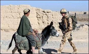 Prince Harry patrols Garmsir, Afghanistan The third-in-line to the British throne has been in Afghanistan since December.