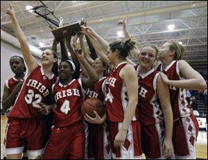 Central Catholic celebrates its Division I regional championship victory over Solon.