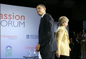 Democratic presidential hopeful, Sen. Hillary Rodham Clinton, D-N.Y., leaves the stage as Democratic presidential hopeful, Sen. Barack Obama, D-Ill., begins his time participating in a Compassion Forum at Messiah College, in Grantham, Pa., on Sunday.
<br>
<img src=http://www.toledoblade.com/graphics/icons/video.gif> <b><font color=red>AP VIDEO</b></font color=red>: <a href=