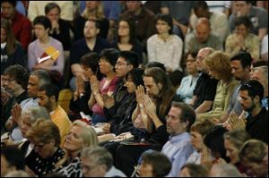 His Holiness entered to no applause from the crowd, for whom security was strict at the two sessions.