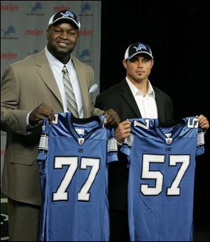 Lions first-round pick Gosder Cherilus (77) is a tackle and
second-round selection Jordon Dizon plays linebacker.
