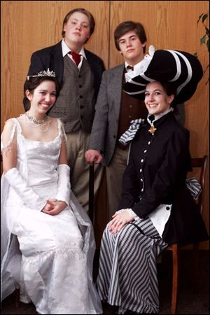 NBR musical01p  Ninth graders standing at rear Isaiah Polstein, as Col. Pickering, left, and Colin Commager, as Henry Higgins, standing at rear, pair up with Arile (cq) Cheung, left, and Caitlin (cq) Leow, both seniors and both playing 