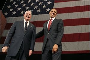 Democratic presidential hopeful, Sen. Barack Obama, D-Ill., right, and former Indiana Rep. Lee Hamilton arrive at the Jefferson Jackson Day Dinner in Indianapolis on Sunday.