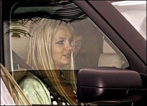 Britney Spears is driven away from Los Angeles County Superior court after a custody hearing Tuesday, May 6, 2008, in Los Angeles.