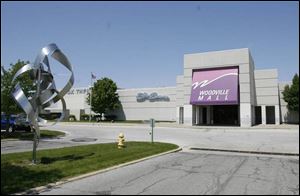 The retail center on Woodville Road was acquired in 2004 by two California investors and was put up for sale last year.