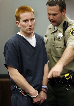 A San Diego County Sheriff's deputy, right, escorts defendant Patrick Hawley, left, into the courtroom during his arraignment in San Diego County Superior Court on Tuesday in San Diego. Hawley, who was arrested by officers in Operation Sudden Fall, is charged with the sale of cocaine. 