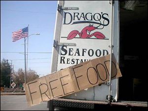 Drago's Seafood Restaurant in Metarie, La., near New Orleans set up refrigerated trucks in its parking lot and gave away food.