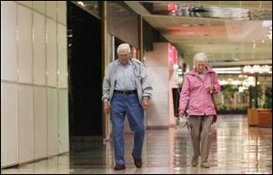 Carl and Ruth Jenne, right, said they would miss the mall for walking more than shopping.
