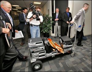 Marc Dann submitted his resignation hours after investigators from Ohio Inspector General Tom Charles' office descended on his office and confiscated computer equipment.