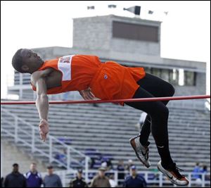 Southview Junior Shaun Joplin clears 6-9 to set a Northern Lakes League high jump record.