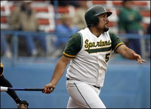 Phil Macias smacks a two-run home run for Start in the sixth inning as the Spartans beat Northview for a district crown. (ASSOCIATED PRESS)
<br>
<img src=http://www.toledoblade.com/graphics/icons/video.gif> <b><font color=red>VIEW</b></font color=red>: <a href=