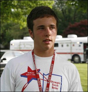Garrett Walker, 16, describes how the low-flying plane s wings  swayed back and forth.  The Fremont resident, who was driving to a friend s house, heard  a loud pop . . . like a firework. 
