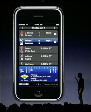 A representative of MLB.com demonstrates a program for Major League Baseball scores and videos. (ASSOCIATED PRESS)
<br>
<img src=http://www.toledoblade.com/assets/gif/weblink_icon.gif> <font color=red> <b>LINK</font color=red></b>: <a href=