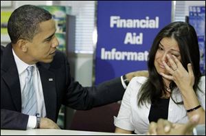 Sen. Barack Obama comforts student Marilyn Pace during a campaign stop at Wayne County Community College of Taylor, Mich., where she discussed her financial aid situation. The Illinois Democrat told students if he s elected president, his administration would provide tax credits in exchange for community service. 