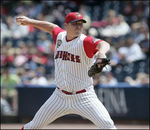 Blaine Neal pitches Tuesday against Syracuse when he picked up his 20th save. The 13-year veteran is hoping to get back to the major leagues for the first time since 2005.