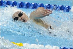 Katie Hoff swims to a first-place finish and an American record in the women's 200-meter freestyle final at the U.S. trials.