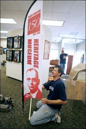 Greg Rippke, facilities manager at Davis College, prepares for tomorrow, the main event of a year-long celebration.