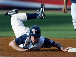 Brent Clevlen is fooled into diving back into second base by a fake pickoff attempt, but Hens hitters were seldom fooled by Scranton pitches.