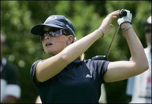 Paula Creamer's 60 in the first round of the Farr Classic broke Se Ri Pak's record of 61 in 1998 at Highland Meadows. She leads South Koreans Eun-Hee Ji and Gloria Park by four strokes. (THE BLADE/DAVE ZAPOTOSKY)
<br>
<img src=http://www.toledoblade.com/graphics/icons/photo.gif> <font color=red><b>VIEW</font color=red></b>: <a href=
