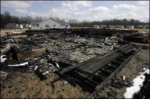 A former Bedford High School student was convicted of setting fire to this home on Fountain Circle in Lambertville in March.