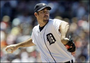 ABOVE: The Tigers' Justin Verlander fanned eight and allowed four hits to defeat Minnesota yesterday at Comerica Park.
