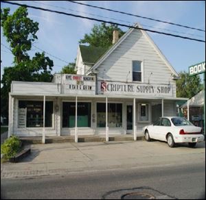 The city is buying this property on Monroe Street for $165,000 as part of its plan to improve the area's curb appeal and appearance.