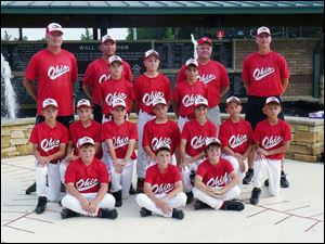 The 11U Ohio Diamond Hawks: back row, from left, coaches Ron Rightnowar, Greg Buescher, Craig Stambaugh, and Kevin Johnson. Players standing: TJ Lake, Jared Rettig, and Louie Mauro. Kneeling: Colin Kaucher, Tyler Stambaugh, Noah Best, Connor Bowen, Luke Rightnowar, Josh Kruzel, and Casey Johnson. Sitting: Danny Kruzel, Camden Buescher, and Trevor Hafner.