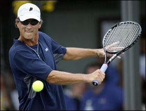 Todd Dominiak defeated Joao Pinho 6-4, 6-2 at the Toledo
Tennis Club to win his 10th City of Toledo singles title. It came 20 years after he won his first championship. 