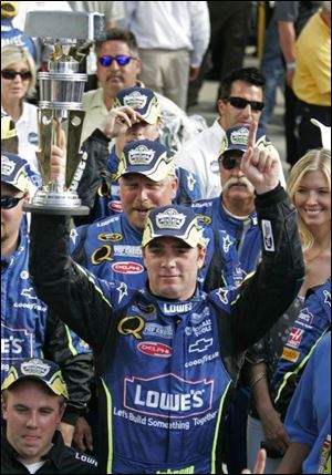Jimmie Johnson won the Allstate 400  yesterday at the Indianapolis Speedway  which turned into a series of short sprints because the Car of Tomorrow used by the drivers caused more stress on tires than expected.