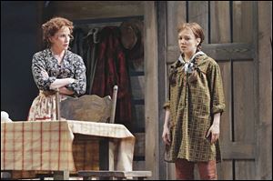 Melissa Gilbert, left, plays the matriarch of the Ingalls family in the Guthrie Theatre s production of Little House on
the Prairie. Gilbert played daughter Laura in the TV show; Kara Lindsay has that role in the Minnesota musical.
