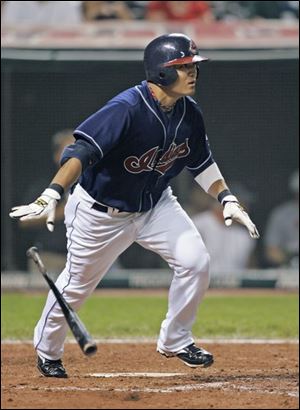 The Indians  Shin-Soo Choo watches his double off the Tigers  Armando Galarraga to drive in a run in the sixth inning.
