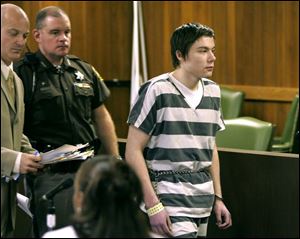 Michael Sykes leaves the courtroom after being sentenced. He said little to explain his actions. 