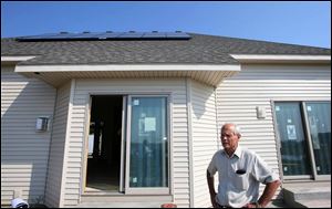 Bill Decker, Sr., of Bedford Township-based Decker Homes is developing an energy-effi cient home in Monclova that utilizes solar panels to complement a geothermal system.
