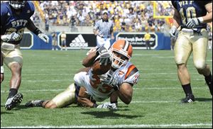 The Falcons' Chris Bullock stretches but comes up short of the end zone against Pittsburgh. He had 93 total yards.