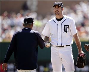 That's all for Justin Verlander, as Detroit skipper Jim Leyland takes the ball from the pitcher, who was shelled yesterday.