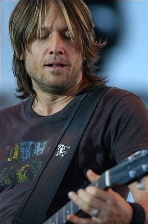 Do you prefer your celebrity T-shirt washed or <a href=