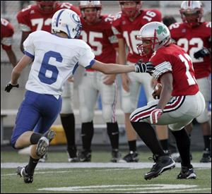 Central s Nate Hobbs shifts gears in order to fake out AW s Jordan Chipka on the way to a first-quarter touchdown.
<BR>
<img src=http://www.toledoblade.com/graphics/icons/photo.gif> <b>HIGH SCHOOL FOOTBALL WEEK 3:</b> View <a href=http://www.toledoblade.com/apps/pbcs.dll/gallery?Avis=TO&Dato=20080906&Kategori=SPORTS12&Lopenr=906009997&Ref=PH><b><font color=red> Central - Anthony Wayne</font color=red> </b></a> football photo gallery