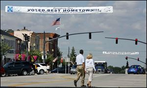 A new banner hanging over Louisiana Avenue in Perrysburg touts the Wood County city s award from Ohio Magazine as one of the best hometowns in the state for 2009. The magazine looked at such factors as community spirit, education, entertainment, health and safety, and culture and  heritage. City officials and boosters hope it will spur tourism and business. 
