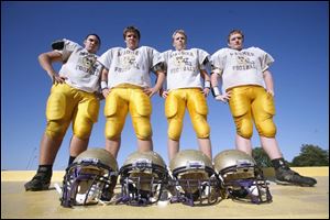From left, Maumee linemen Xavier Ramirez, Justin Rippke, Tim Wilhelm, and Brendan Karchner have led the Panthers to a 4-0 record. Maumee has outscored its opponents 170-40, but it should have a tougher task tonight against rival Perrysburg. 
