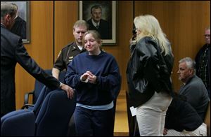 When she was 13, Kristina Adkins said, she stole pills from her grandfather, who has cancer, and mixed them in with the pills of her grandmother, Virginia Bentley, for three days.