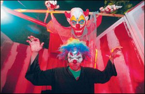 Dylan Hanf, above, in the haunted house at the Sylvania Township home of Nick Francis, 16. Nick s cousin, Max Simon, 14, is co-owner.