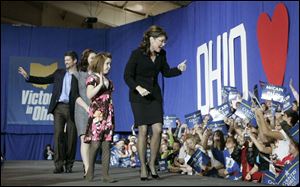 Sarah Palin gets the crowd fired up at the University of Findlay. The Republicans also spoke near Akron and in Cincinnati.