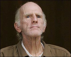 Robert Bowman is arraigned in Toledo Municipal Court in Toledo, Ohio, Tuesday, October 28, 2008.  He is charged in the 1967 murder of Eileen Adams. Public defender James MacHarg is at left.