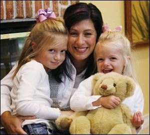 Lisa Melby with daughters Frances, left, and Margo.