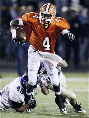 Shaun Joplin eludes Lexington defenders in a playoff game. The Southview senior receiver led the Northern Lakes league in receptions this year. He also plays as a defensive back, punts and kicks.