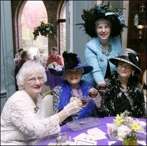 NBRW tea13p  11/07/2008     Blade Photo/Lori King  from left: Marie Garlick, of Swanton, Rebecca Ott, of Jasper, Mich., Nina Condon, of Oak Harbor, and her mom, Pat Lewandowski, attend annual Tea in the Solarium inside the Manor House at Wildwood Metropark in Toledo, OH.
