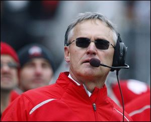 Ohio State coach Jim Tressel was at Southview yesterday afternoon to congratulate Cougars coach Jim Mayzes on the school's recent Division II state championship.