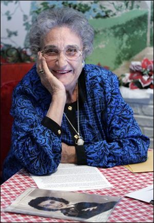 Antoinette Marmar, 86, shows a photo of herself when she was in the WAVES and had a whirlwind romance with Marino  Mike  Narducci after they met at a dance in Washington.
