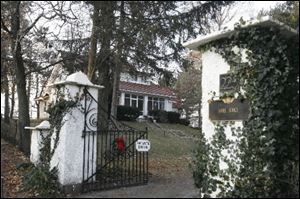 Pearl Barber bought Sans Souci, a waterfront estate in Rossford, from candymaker John Hoffman for less than $50,000 in 1920.
